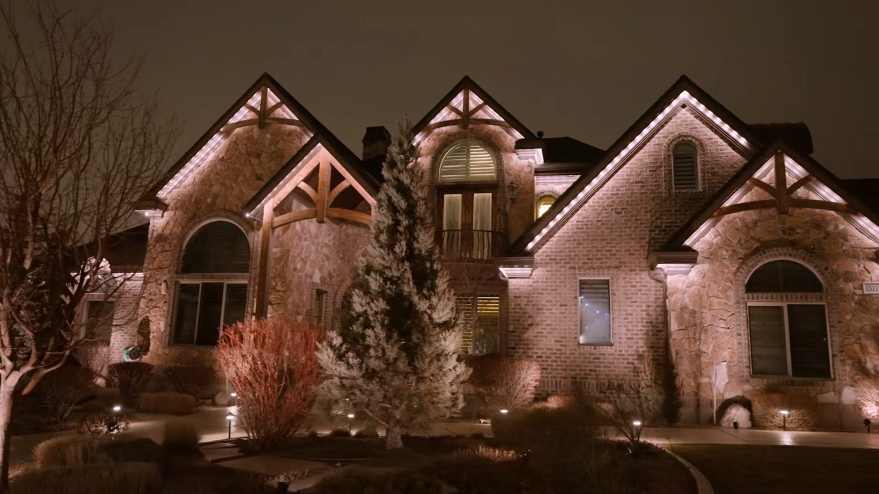 JellyFish permanent lighting along a roofline at night (system footage)